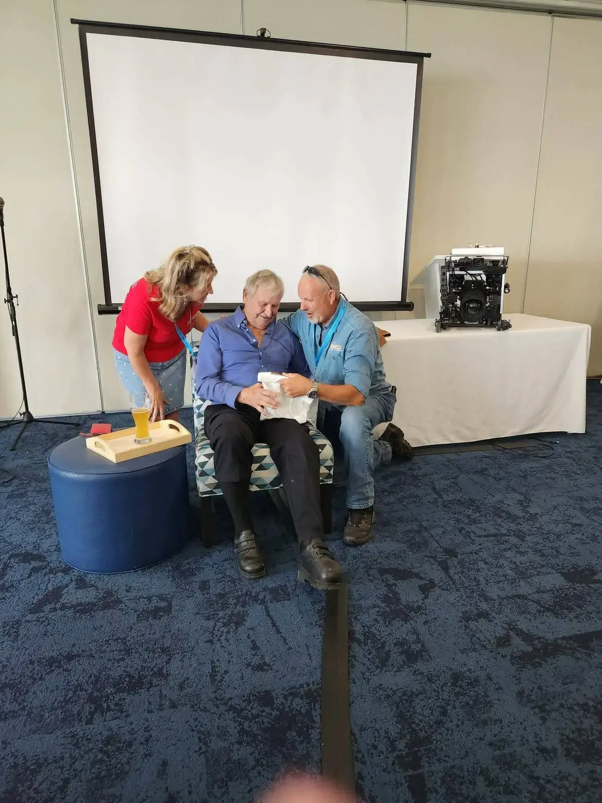 Tony and Lorraine presenting David Blankenshipi with a thank you gift